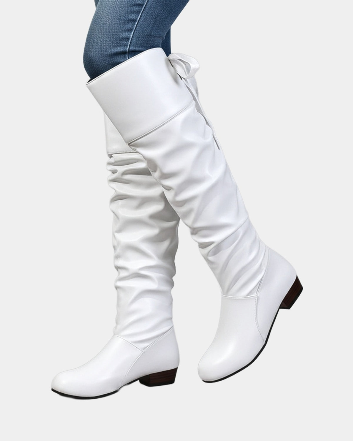 Vionne knee-high slouch boots in white faux leather, studio